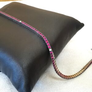 Bracciale tennis in oro nero 18 kt con diamanti e rubini